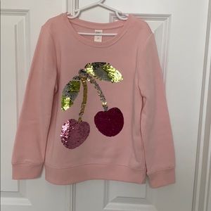 OshKosh girls’ color changing sequin sweatshirt.